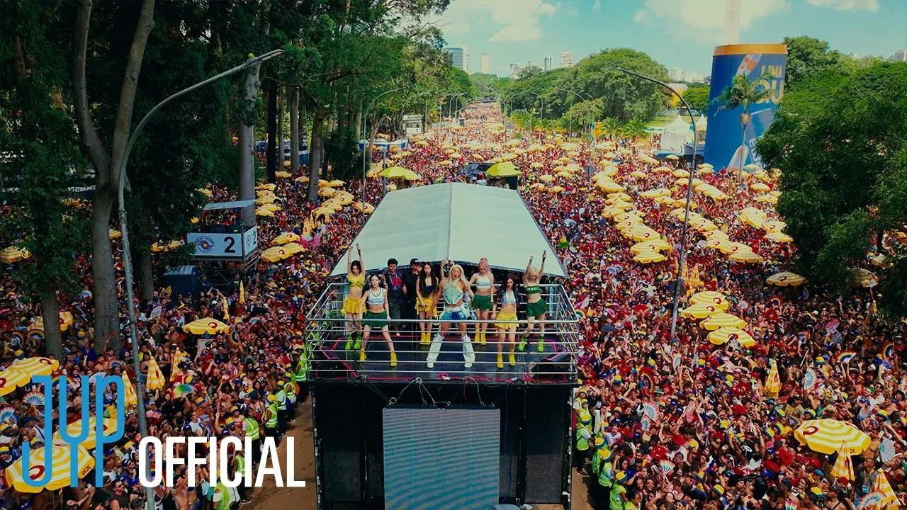 NMIXX performing atop a São Paulo Carnival trio elétrico stage before a crowd of 2 million at Bloco da Pabllo 2026