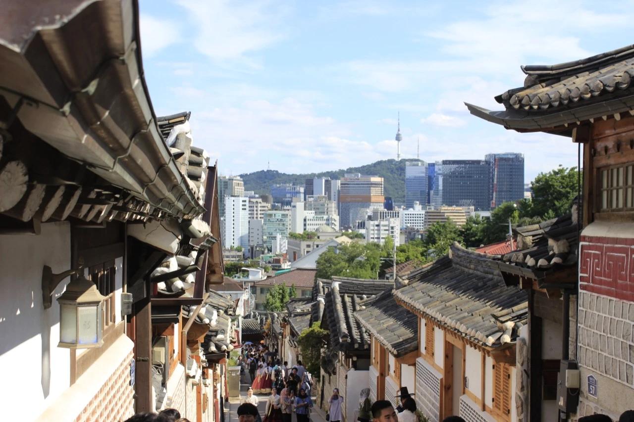 Bukchon Hanok Village in Seoul with N Seoul Tower visible in the background, one of KPop Demon Hunters' key filming locations