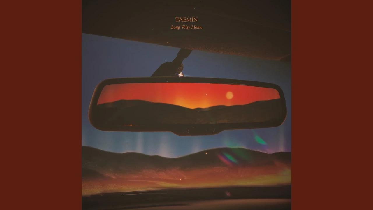 Official single artwork for Taemin Long Way Home: rearview mirror reflecting a desert sunset, 2026. Photo: Galaxy Corporation / The Yoo Group
