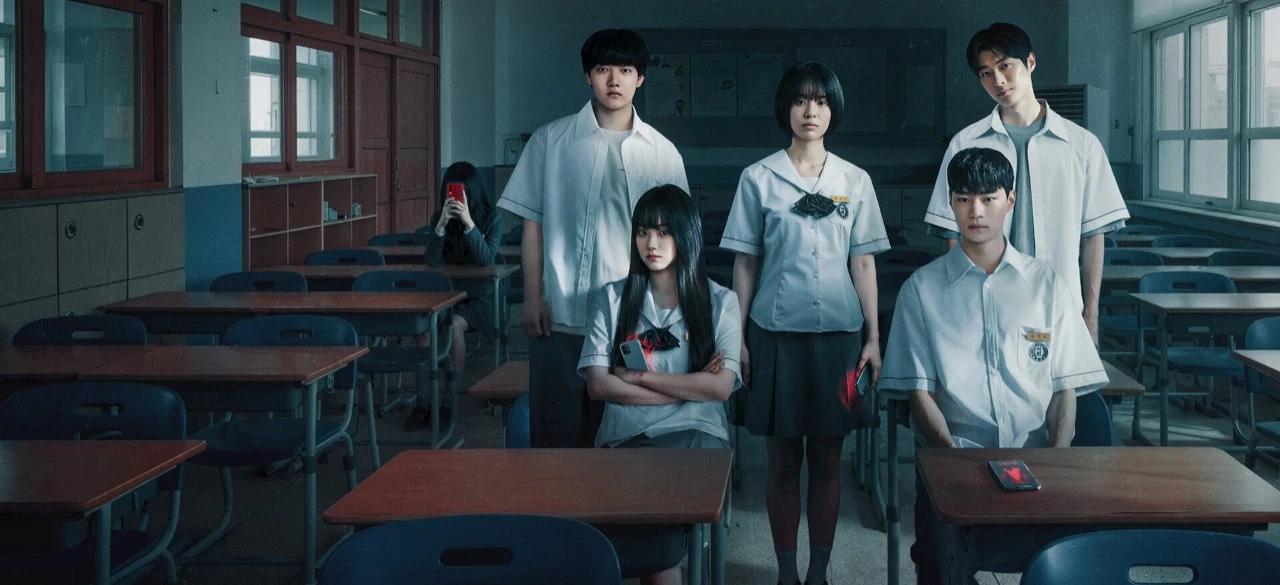 Official Netflix ensemble key art for If Wishes Could Kill showing students in a classroom surrounded by ominous red phones.