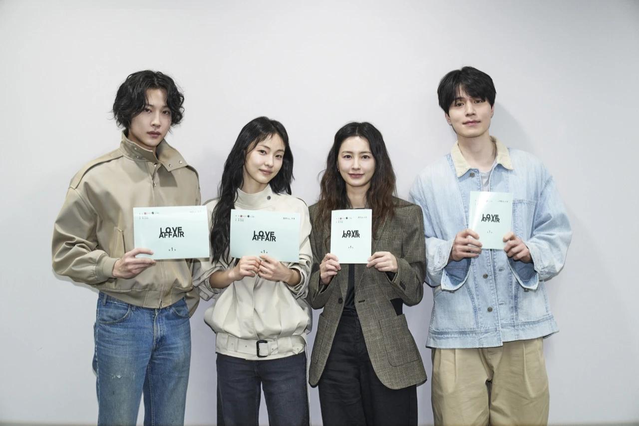 The confirmed cast of The Facade of Love holding scripts at a Netflix drama table read