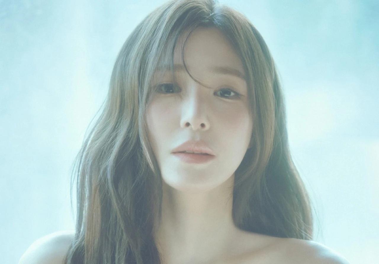 Tiffany Young in a promotional portrait released for her Summer's Not Over rollout