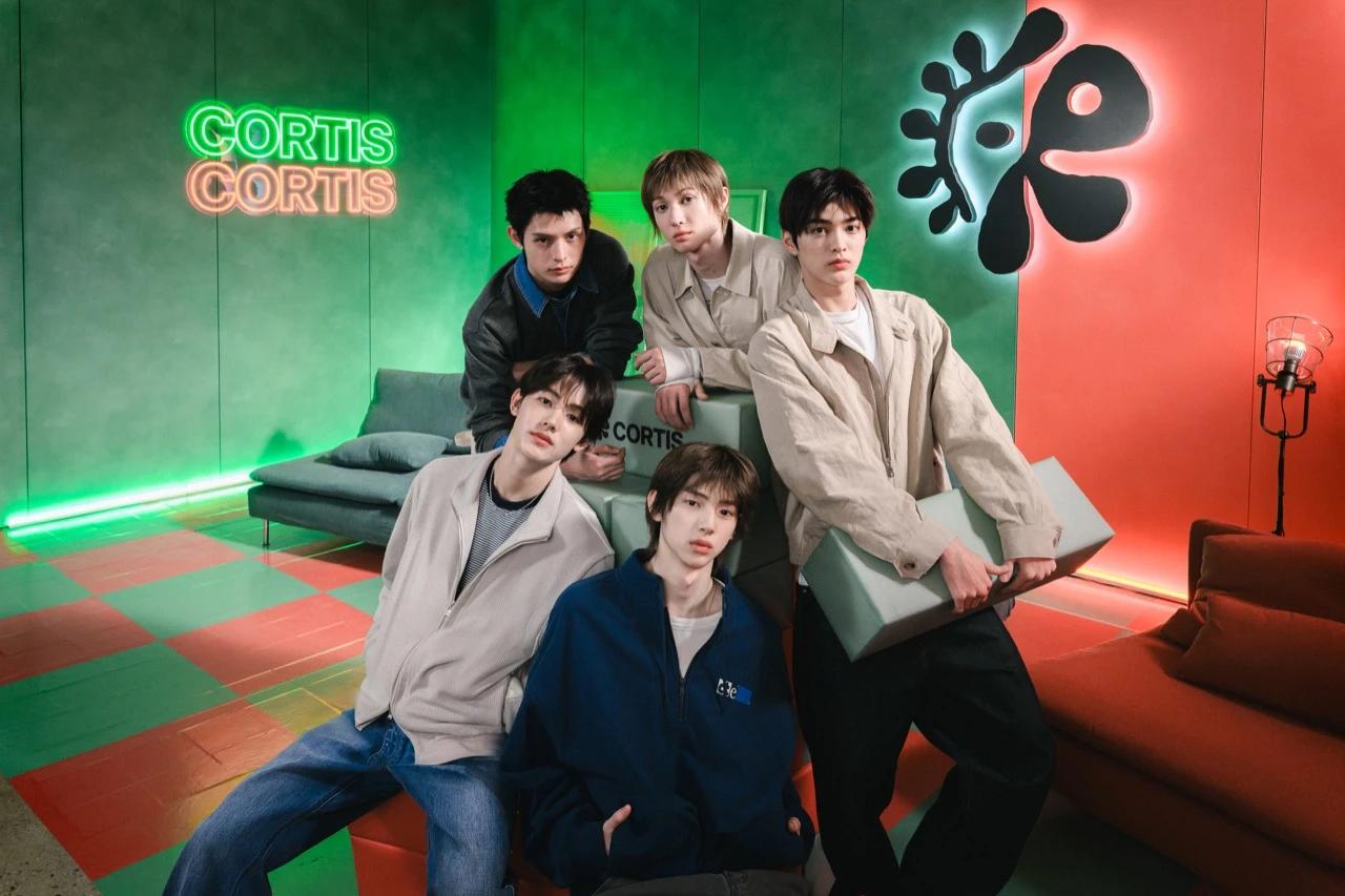 CORTIS pose inside Airbnb's Seoul Hideout activation space for the company's K-culture travel campaign.