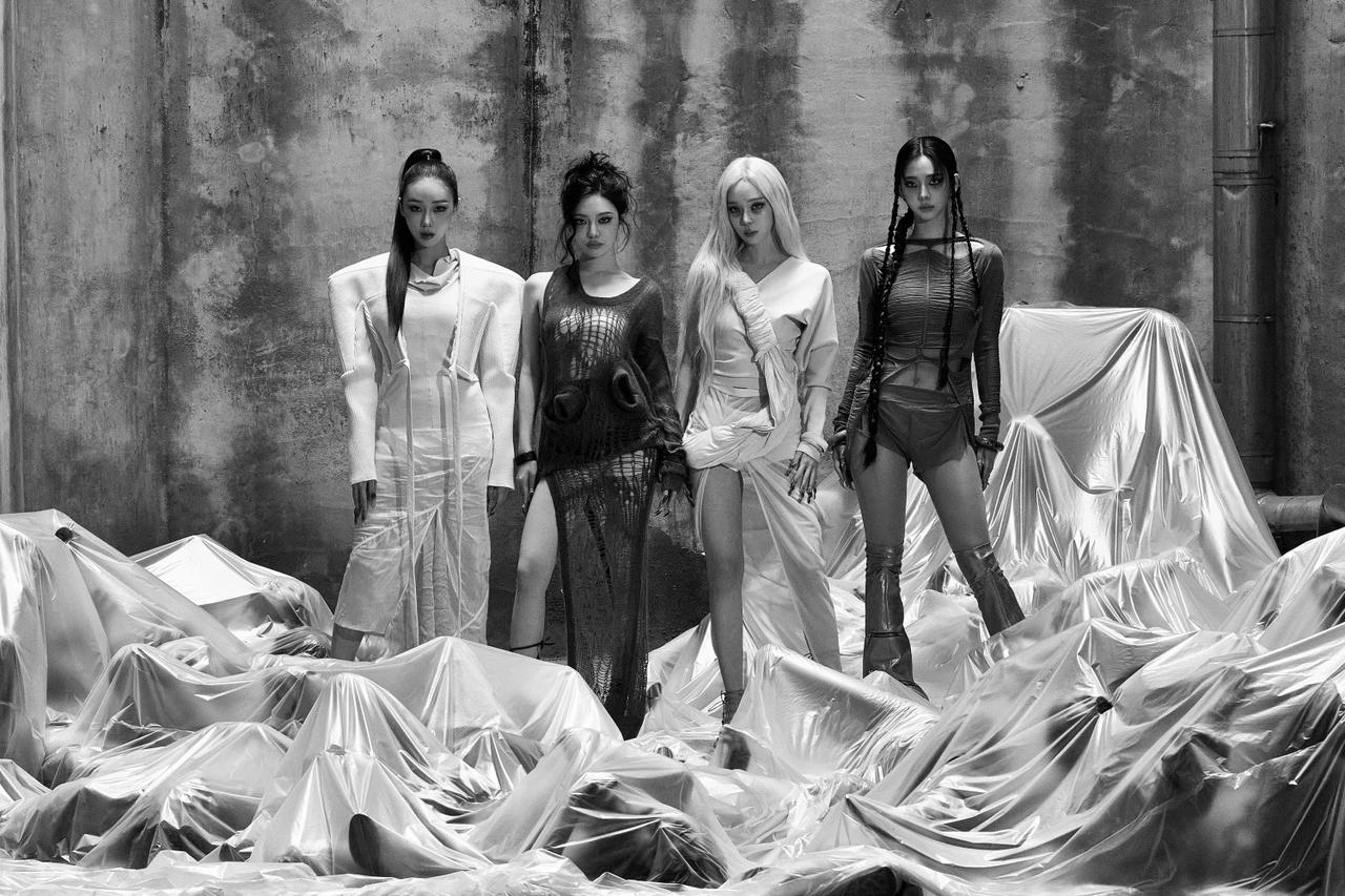 aespa members pose in a monochrome concept image for the WDA and Lemonade rollout