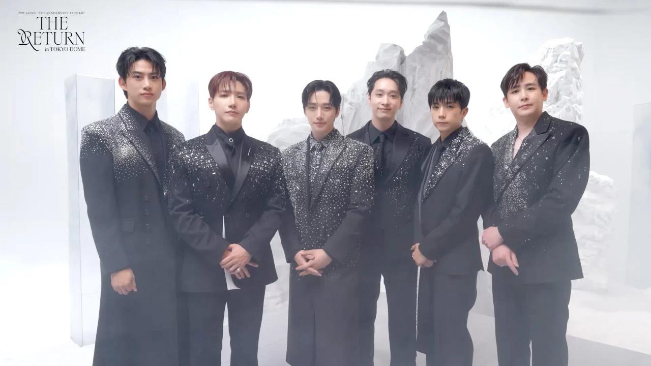 2PM members in black stagewear for The Return in Tokyo Dome, used to illustrate the group's 2026 concert return