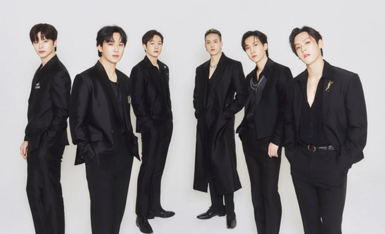 BTOB (λΉν¬λΉ) six-member group photo in all-black suits. Photo: BTOB Company