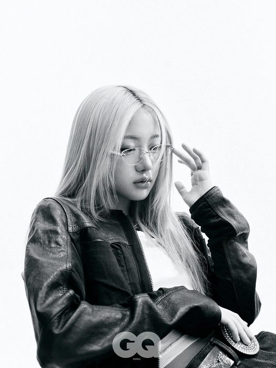 Na Haeun photographed in black and white for GQ Korea's December 2025 Men of the Year issue, wearing a leather jacket.