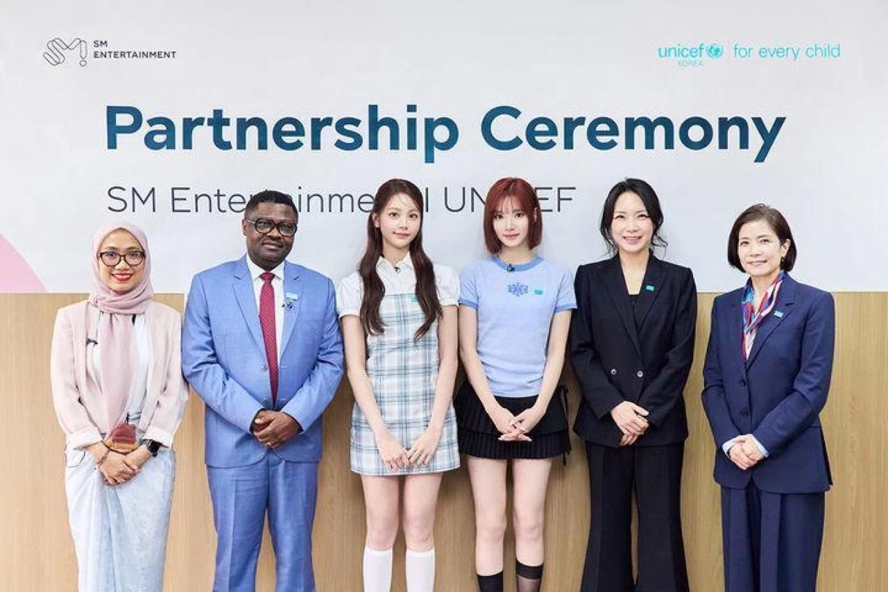 SM Entertainment and UNICEF Korea partnership ceremony signing in Jakarta, March 2026