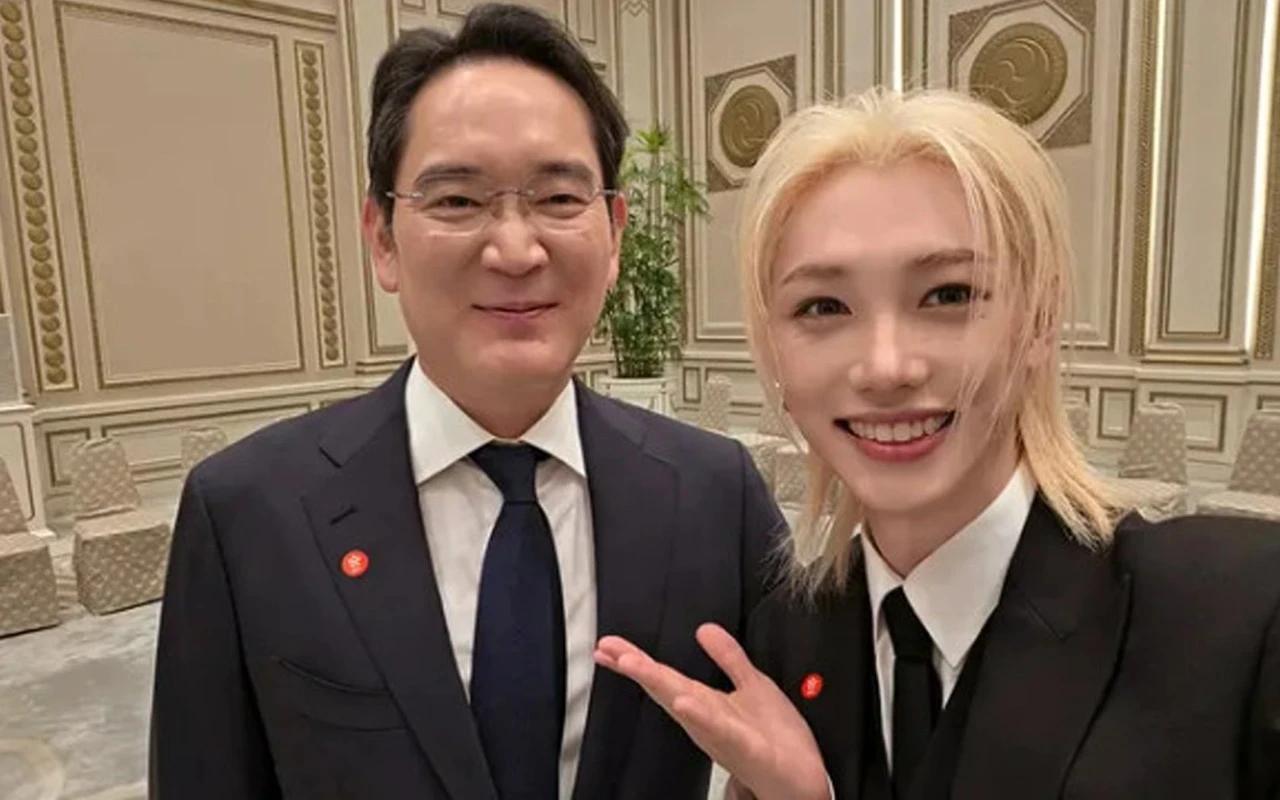 Felix of Stray Kids and Samsung Chairman Lee Jae-yong posing for a selfie at the Blue House state luncheon in April 2026