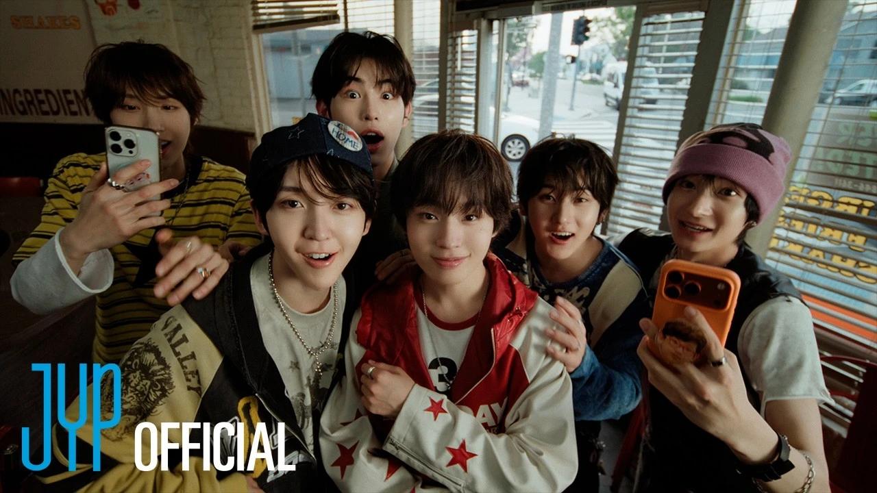 KickFlip in a diner-style scene from the official Eye-Poppin music video