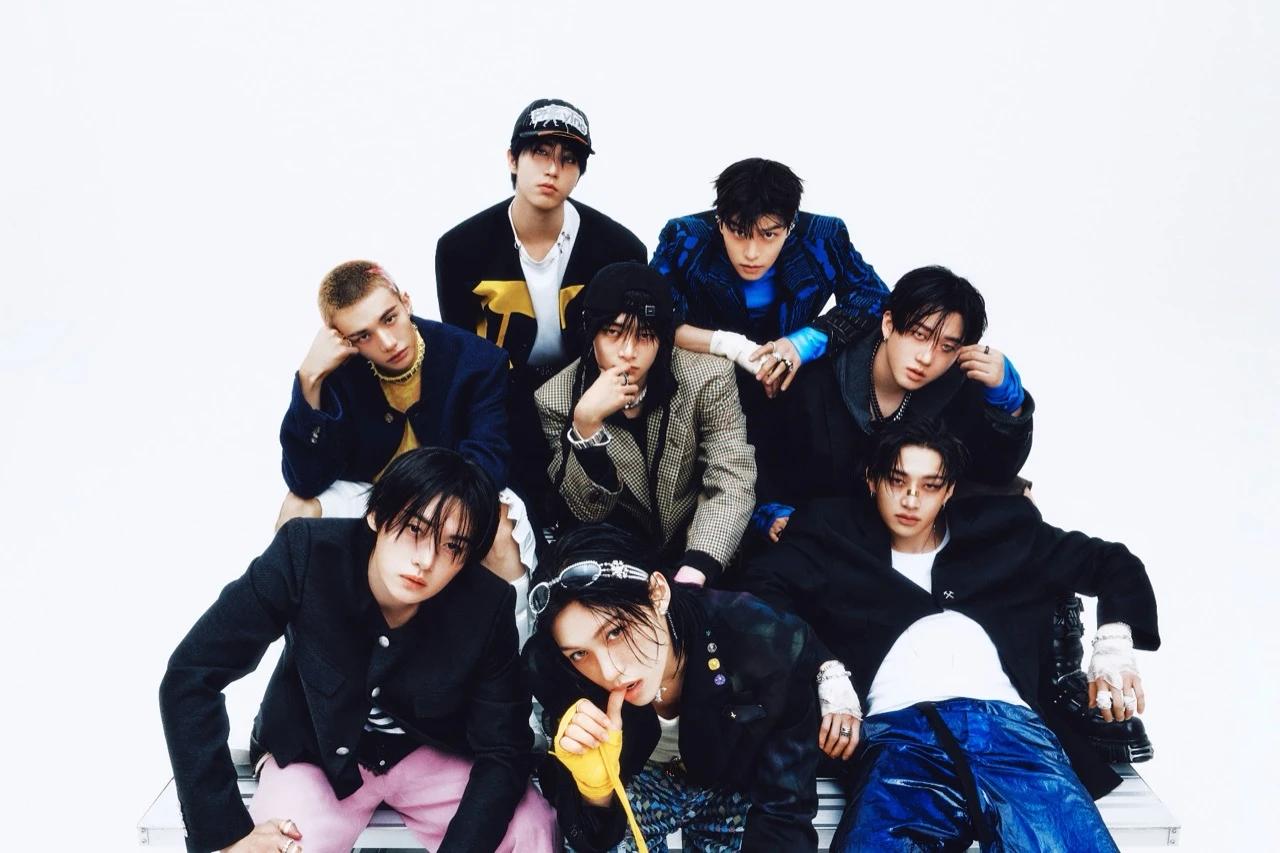 Stray Kids in a studio group portrait released by JYP Entertainment